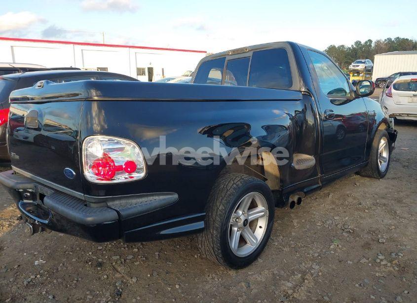 Photo 4 of 2004 Ford F-150 HERITAGE LIGHTNING (VIN 2FTRF07334CA19761)