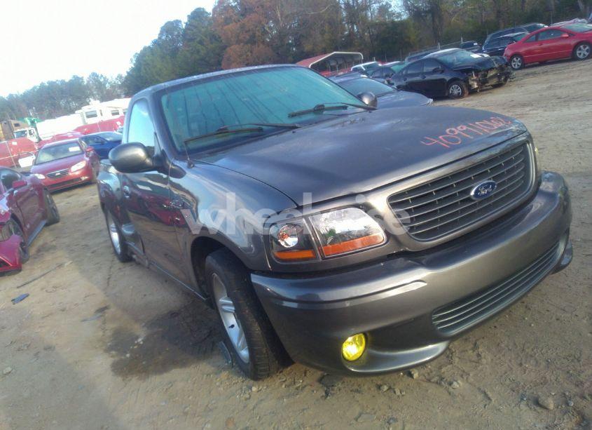 2004 Ford F-150 HERITAGE LIGHTNING (VIN 2FTRF07394CA51873) main photo