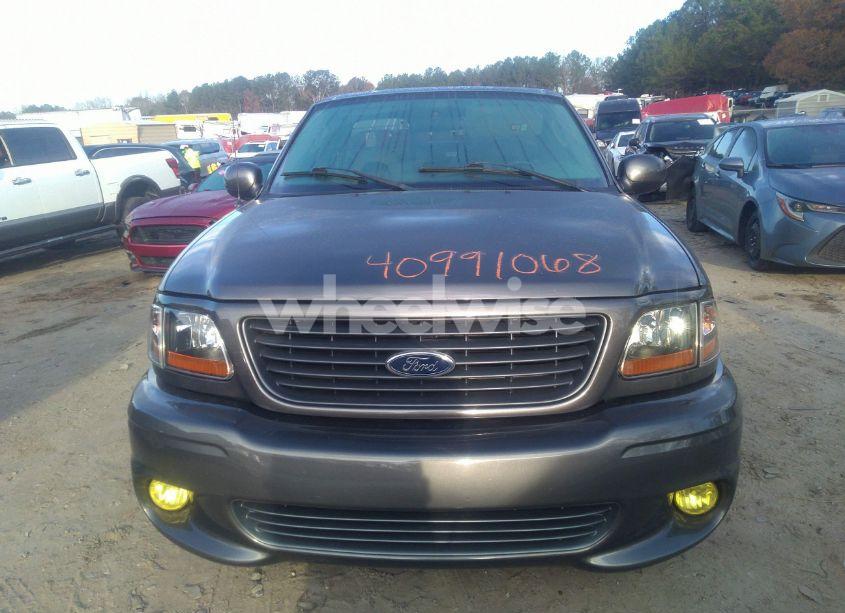 Photo 12 of 2004 Ford F-150 HERITAGE LIGHTNING (VIN 2FTRF07394CA51873)
