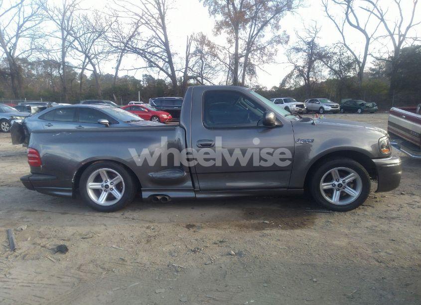 Photo 13 of 2004 Ford F-150 HERITAGE LIGHTNING (VIN 2FTRF07394CA51873)