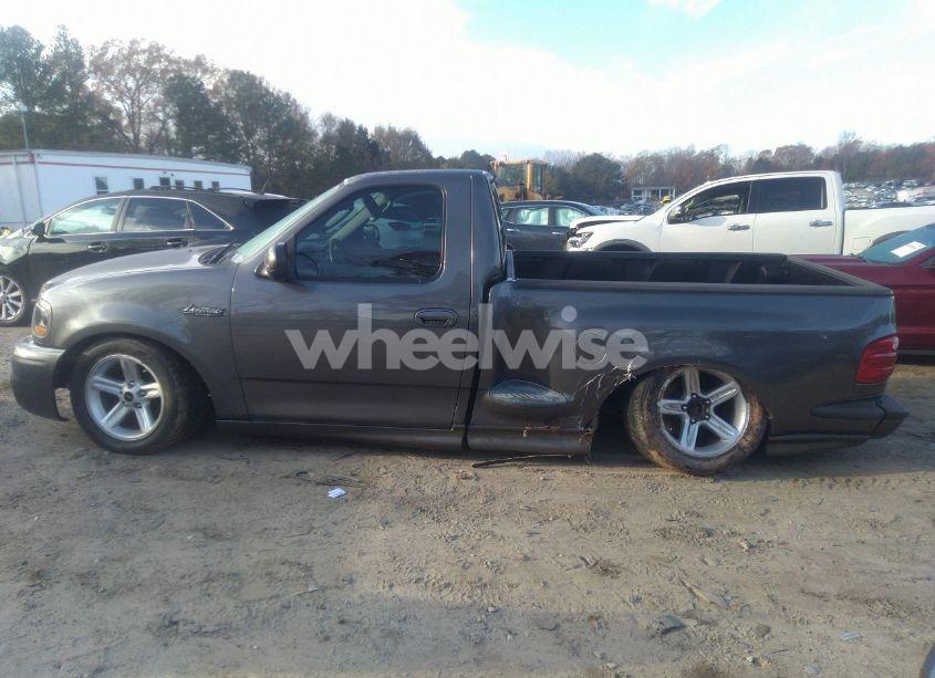 Photo 14 of 2004 Ford F-150 HERITAGE LIGHTNING (VIN 2FTRF07394CA51873)