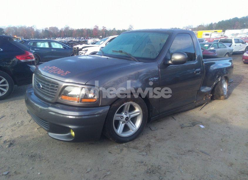 Photo 2 of 2004 Ford F-150 HERITAGE LIGHTNING (VIN 2FTRF07394CA51873)