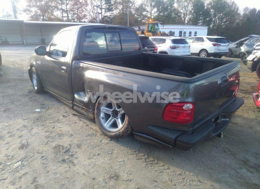 Photo 3 of 2004 Ford F-150 HERITAGE LIGHTNING (VIN 2FTRF07394CA51873)