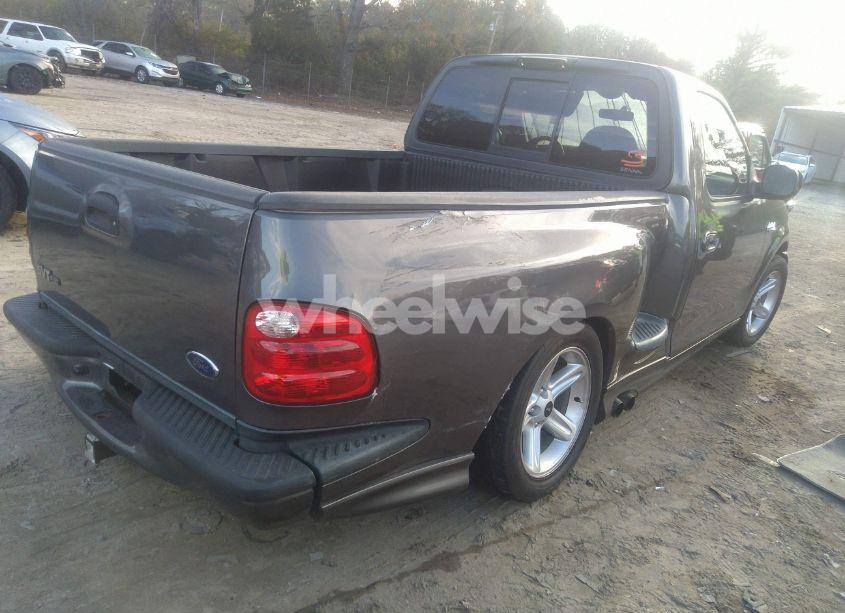 Photo 4 of 2004 Ford F-150 HERITAGE LIGHTNING (VIN 2FTRF07394CA51873)