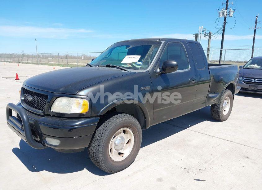 Photo 2 of 2000 Ford F-150 LARIAT/XL/XLT (VIN 2FTRX08L6YCA24700)