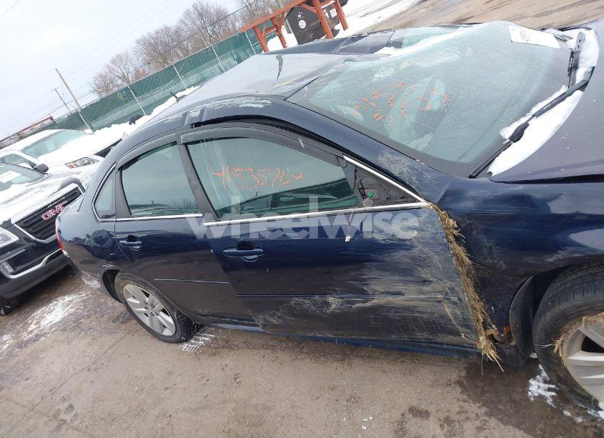 Photo 13 of 2011 Chevrolet Impala LS (VIN 2G1WA5EK0B1106981)