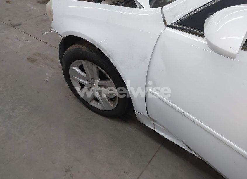 Photo 6 of 2011 Chevrolet Impala LS (VIN 2G1WA5EKXB1135940)