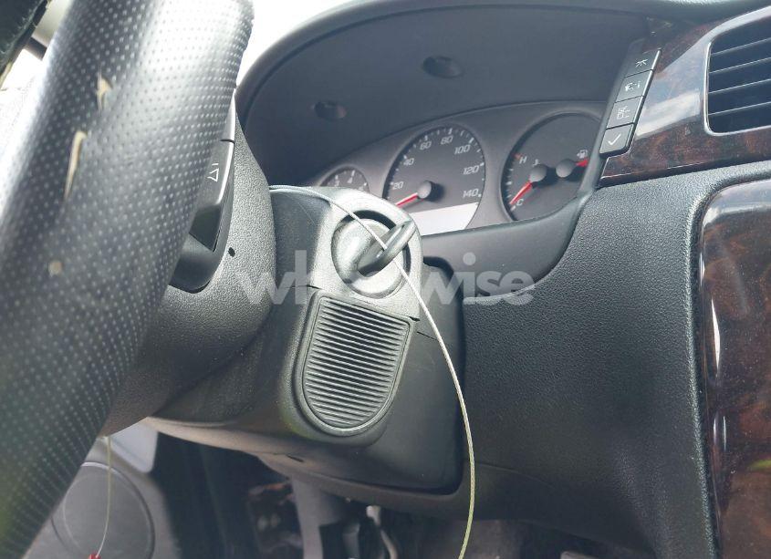 Photo 11 of 2012 Chevrolet Impala LS (VIN 2G1WF5E38C1286013)