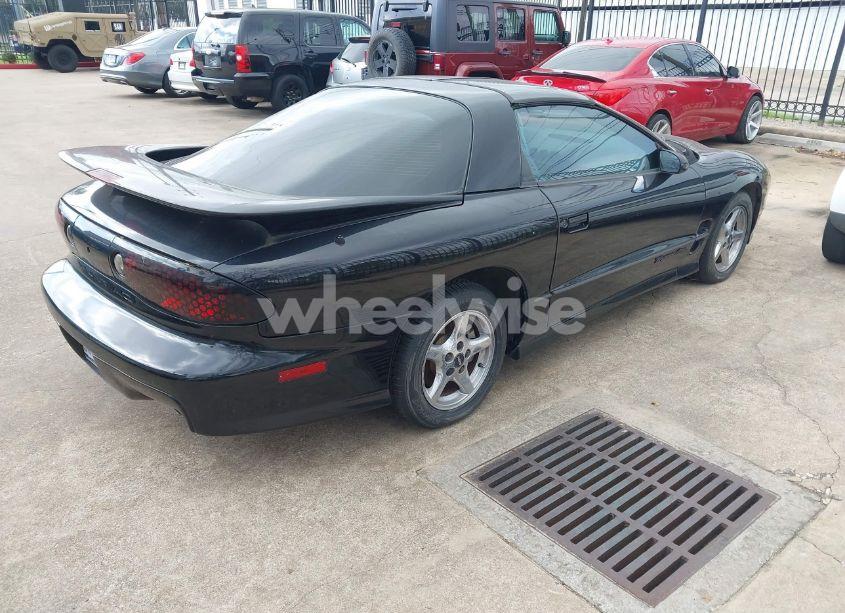 Photo 4 of 2000 Pontiac Firebird FORMULA/TRANS AM (VIN 2G2FV22G1Y2104657)