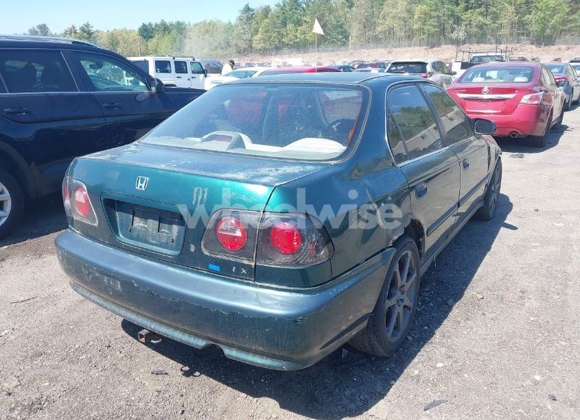 Photo 4 of 1999 Honda Civic LX (VIN 2HGEJ6572XH573808)