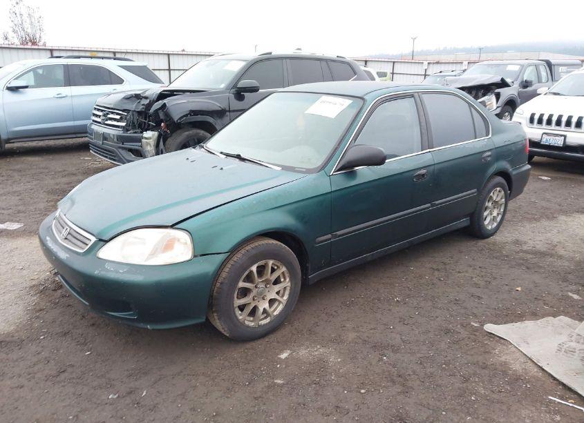 Photo 2 of 1999 Honda Civic LX (VIN 2HGEJ6573XH592075)