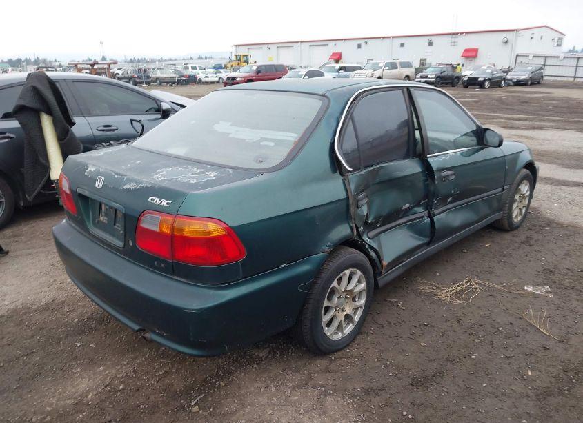 Photo 4 of 1999 Honda Civic LX (VIN 2HGEJ6573XH592075)