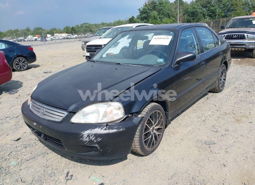 Photo 2 of 1999 Honda Civic LX (VIN 2HGEJ6672XH552777)