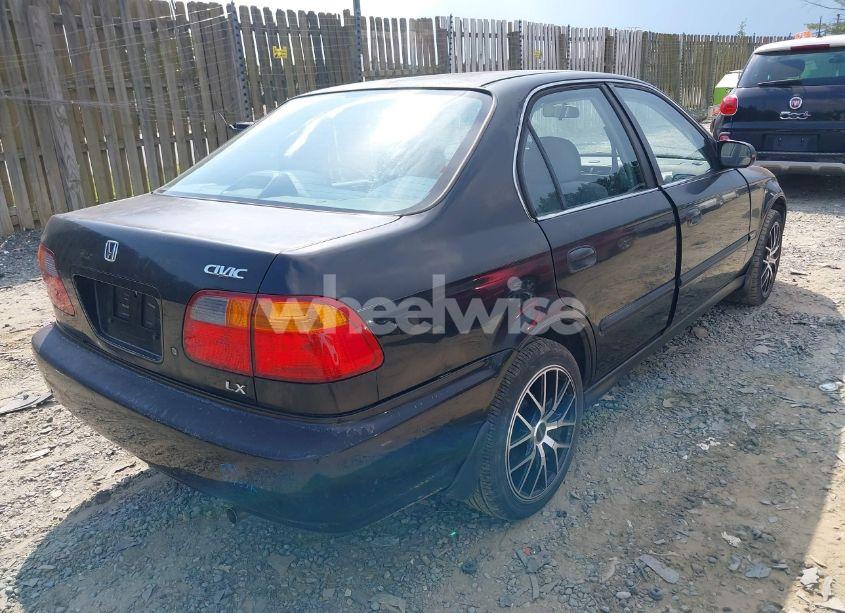 Photo 4 of 1999 Honda Civic LX (VIN 2HGEJ6672XH552777)