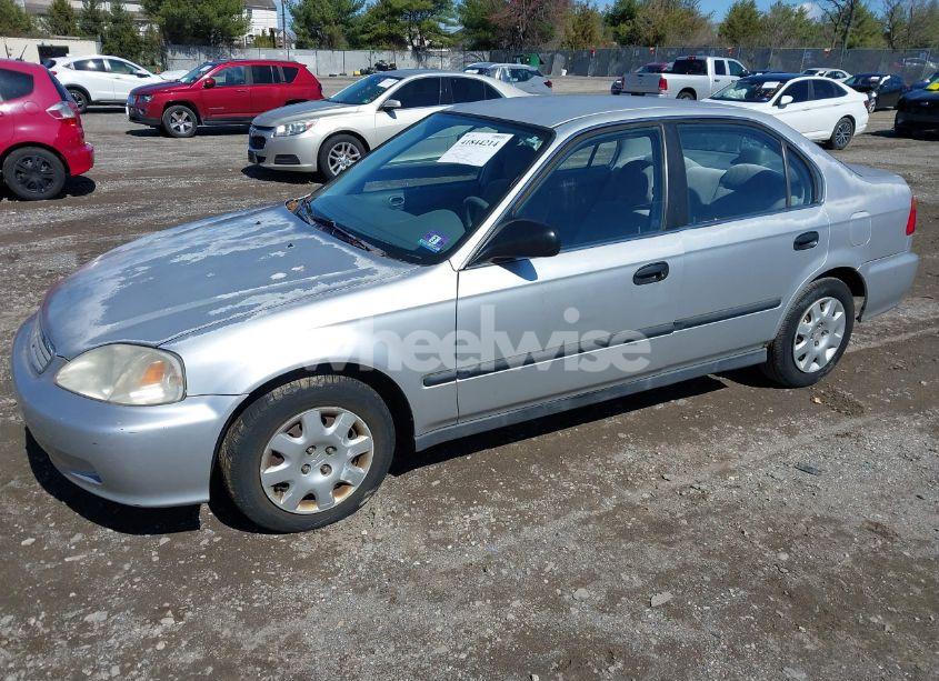 Photo 2 of 1999 Honda Civic LX (VIN 2HGEJ6674XH584081)