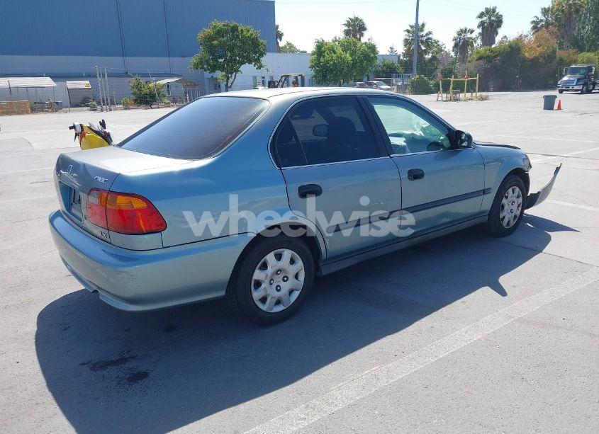 Photo 4 of 1999 Honda Civic LX (VIN 2HGEJ6677XH578467)
