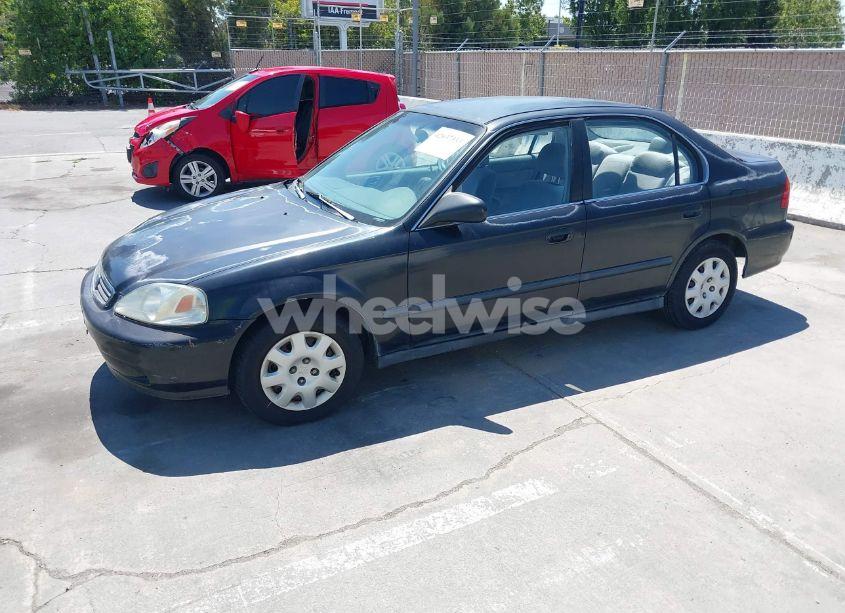 Photo 2 of 1999 Honda Civic LX (VIN 2HGEJ6677XH589937)