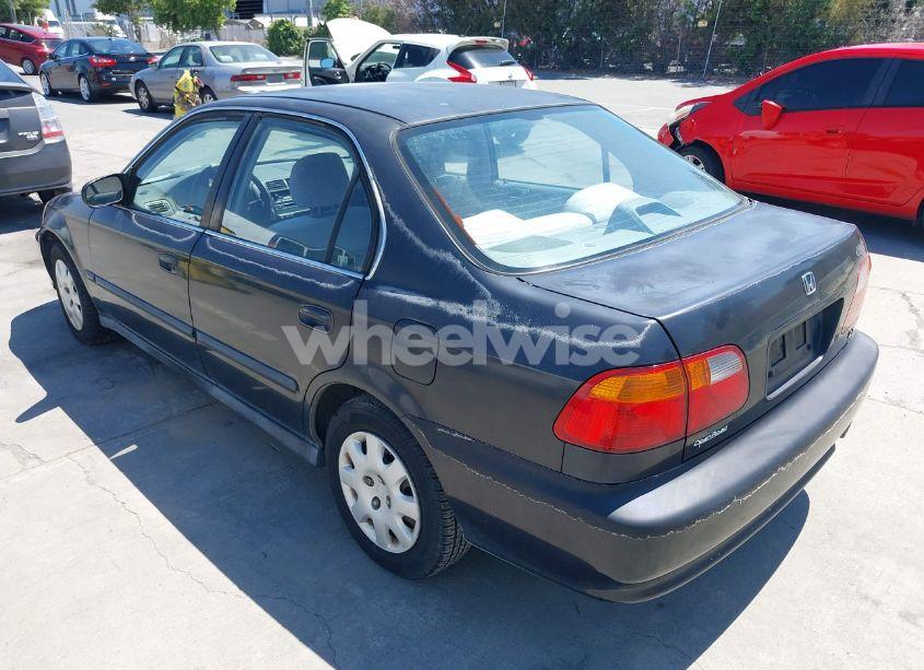 Photo 3 of 1999 Honda Civic LX (VIN 2HGEJ6677XH589937)
