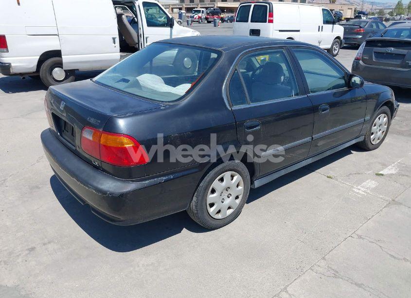 Photo 4 of 1999 Honda Civic LX (VIN 2HGEJ6677XH589937)