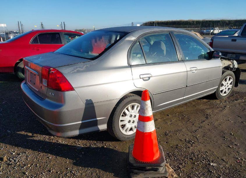 Photo 4 of 2004 Honda Civic LX (VIN 2HGES15594H525975)