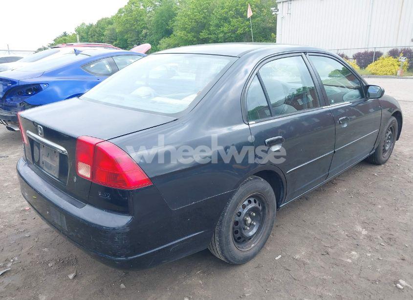 Photo 4 of 2002 Honda Civic LX (VIN 2HGES16502H603829)