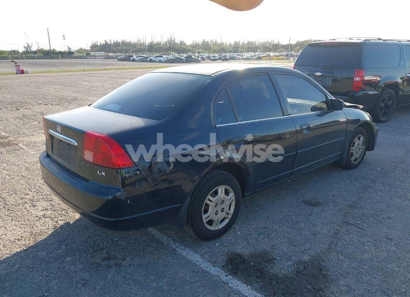 Photo 4 of 2002 Honda Civic LX (VIN 2HGES16542H610606)