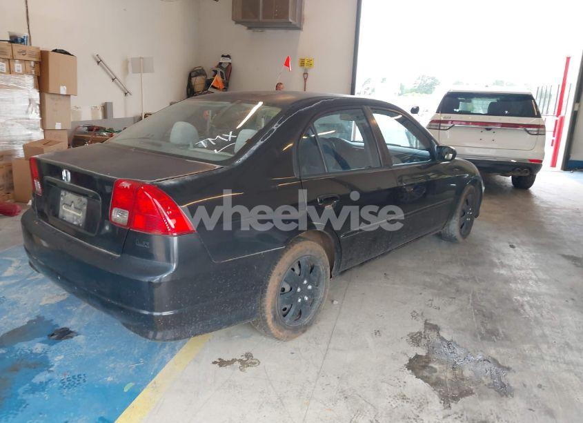 Photo 4 of 2004 Honda Civic LX (VIN 2HGES16564H578910)