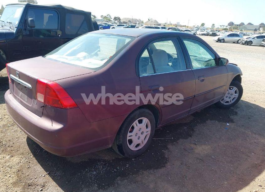 Photo 4 of 2002 Honda Civic LX (VIN 2HGES16592H563332)
