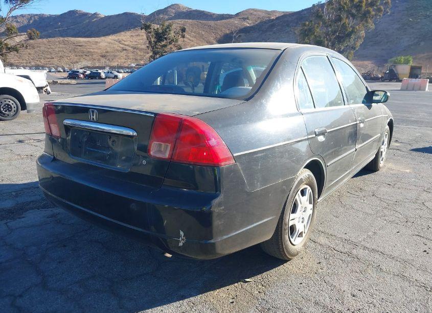 Photo 4 of 2002 Honda Civic LX (VIN 2HGES165X2H592189)