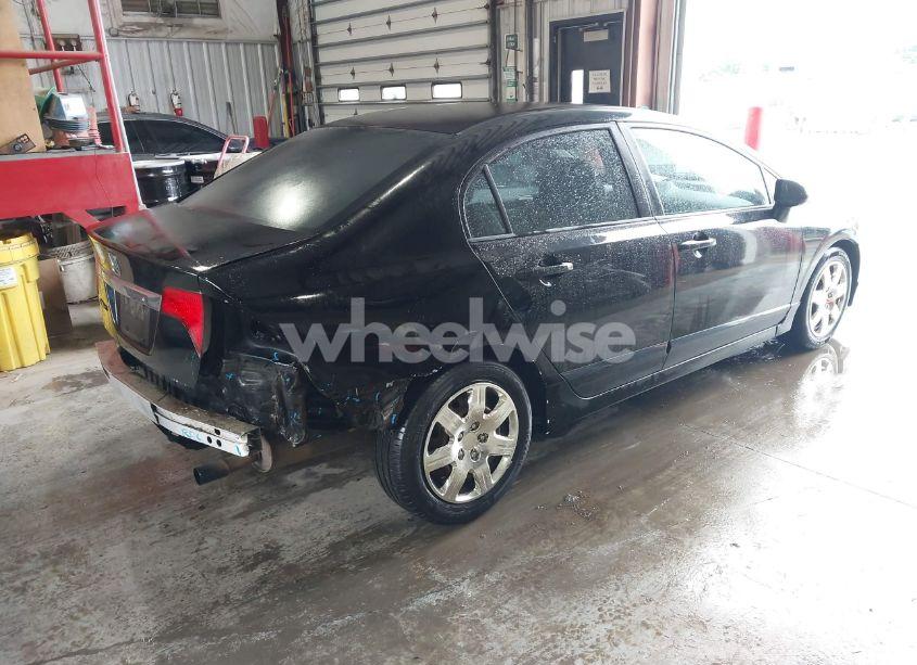 Photo 4 of 2011 Honda Civic LX (VIN 2HGFA1F50BH501566)