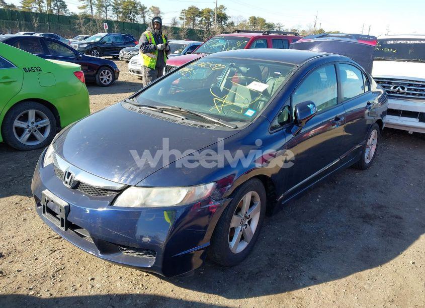 Photo 2 of 2011 Honda Civic LX (VIN 2HGFA1F50BH512860)