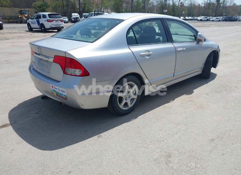 Photo 4 of 2011 Honda Civic LX (VIN 2HGFA1F50BH523325)