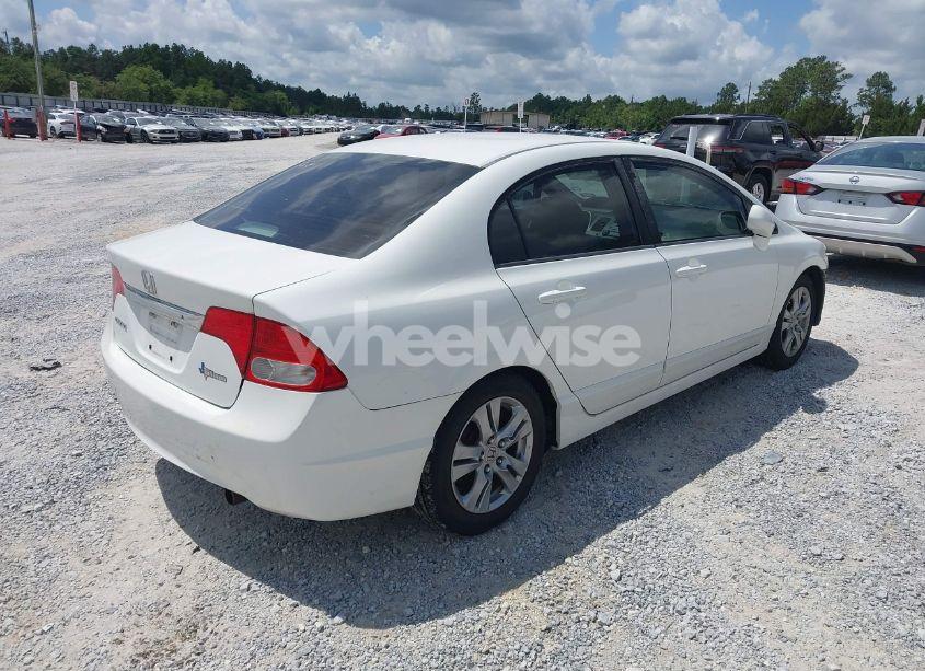 Photo 4 of 2011 Honda Civic LX (VIN 2HGFA1F50BH527486)