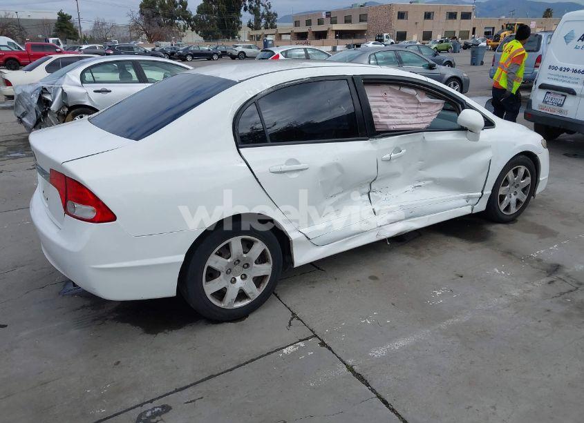 Photo 4 of 2011 Honda Civic LX (VIN 2HGFA1F50BH537323)