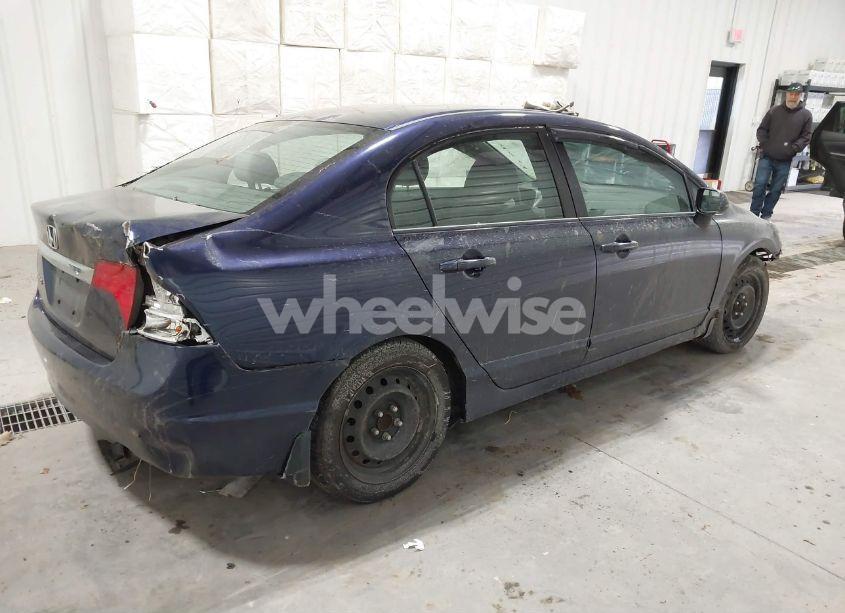 Photo 4 of 2011 Honda Civic LX (VIN 2HGFA1F50BH546412)