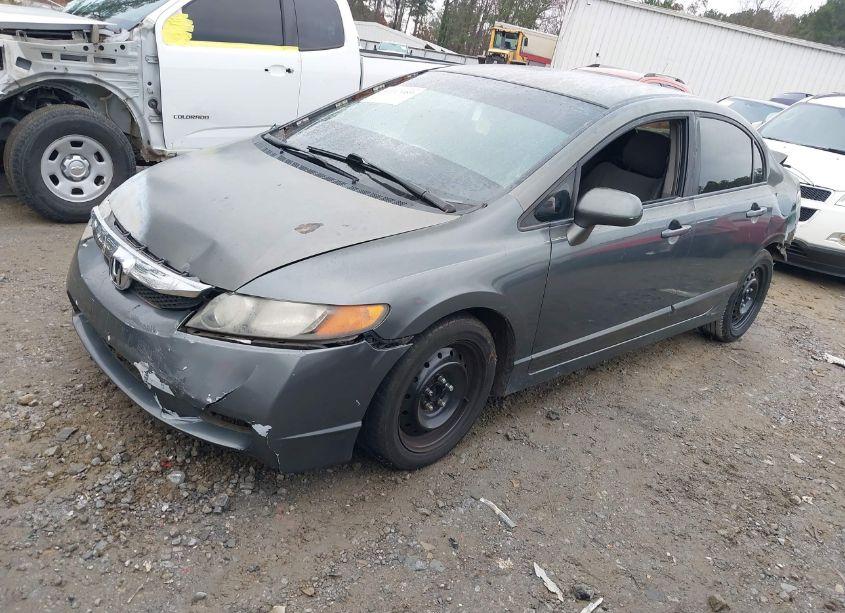 Photo 2 of 2011 Honda Civic LX (VIN 2HGFA1F51BH300694)