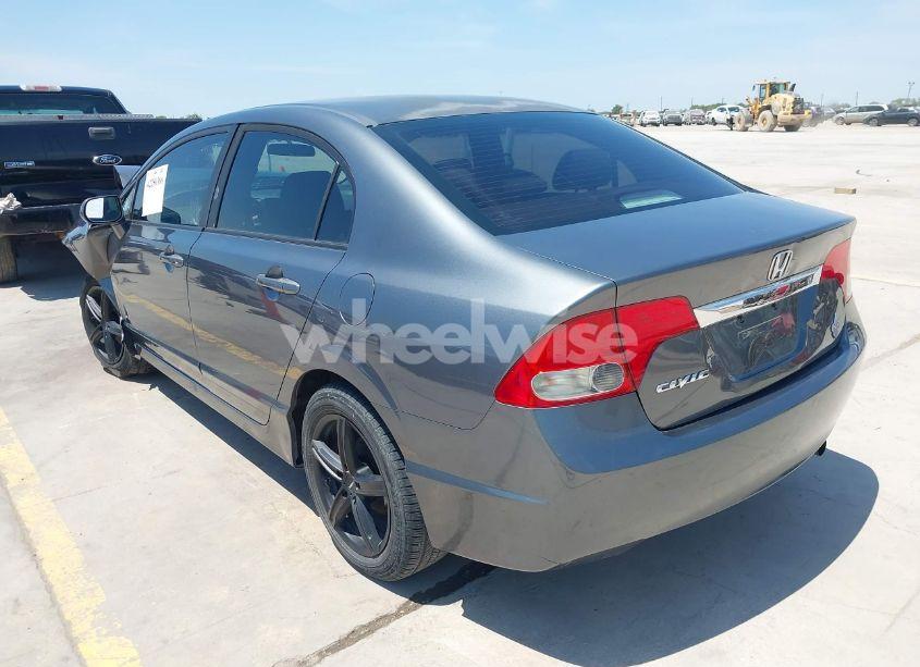 Photo 3 of 2011 Honda Civic LX (VIN 2HGFA1F52BH302826)