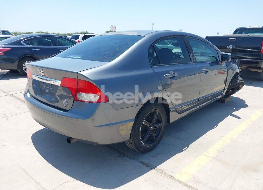 Photo 4 of 2011 Honda Civic LX (VIN 2HGFA1F52BH302826)