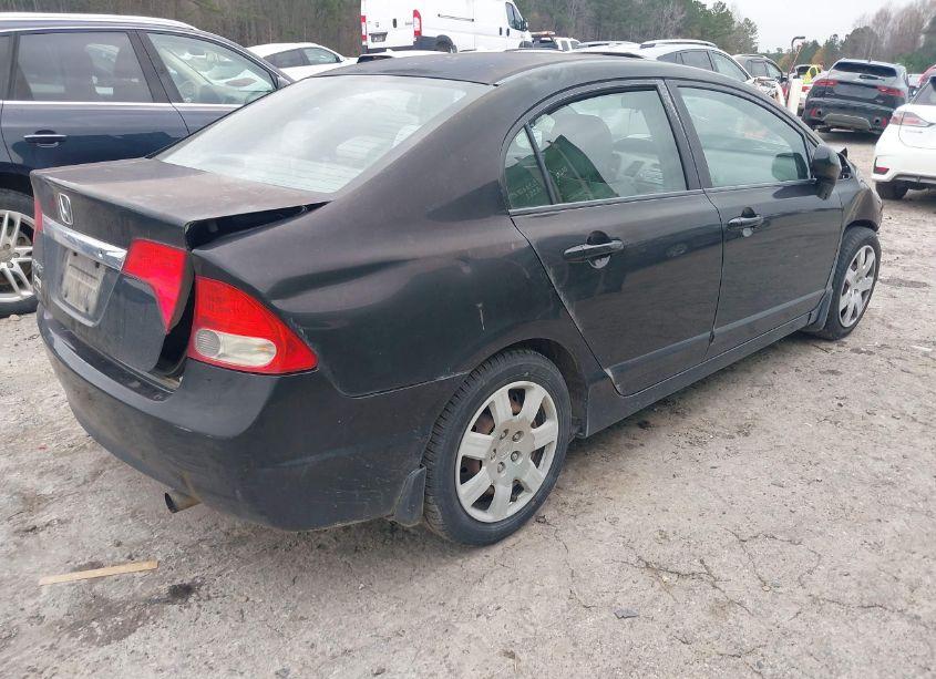 Photo 4 of 2011 Honda Civic LX (VIN 2HGFA1F52BH303653)