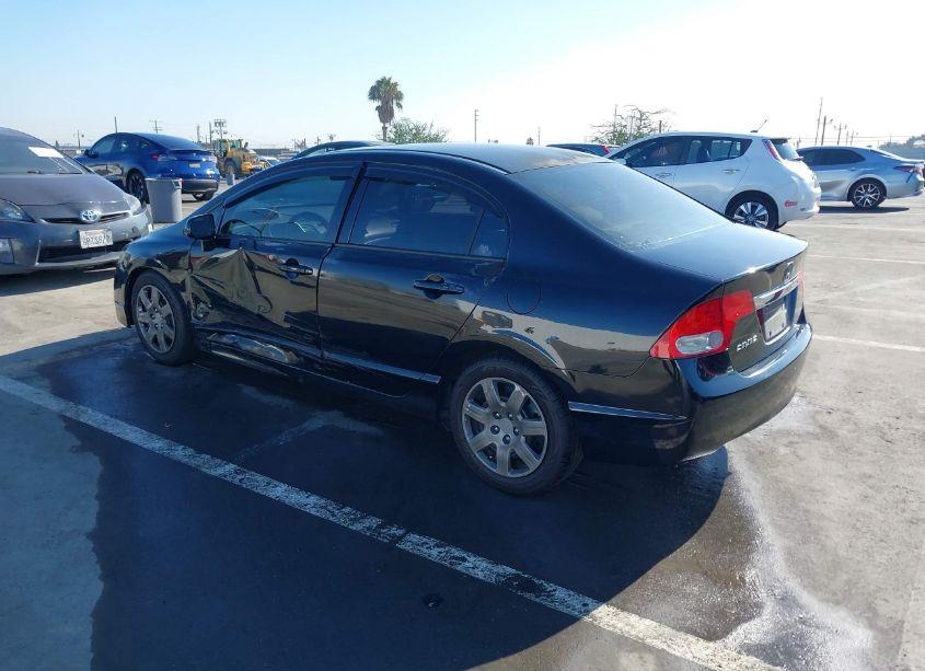 Photo 3 of 2011 Honda Civic LX (VIN 2HGFA1F52BH303894)