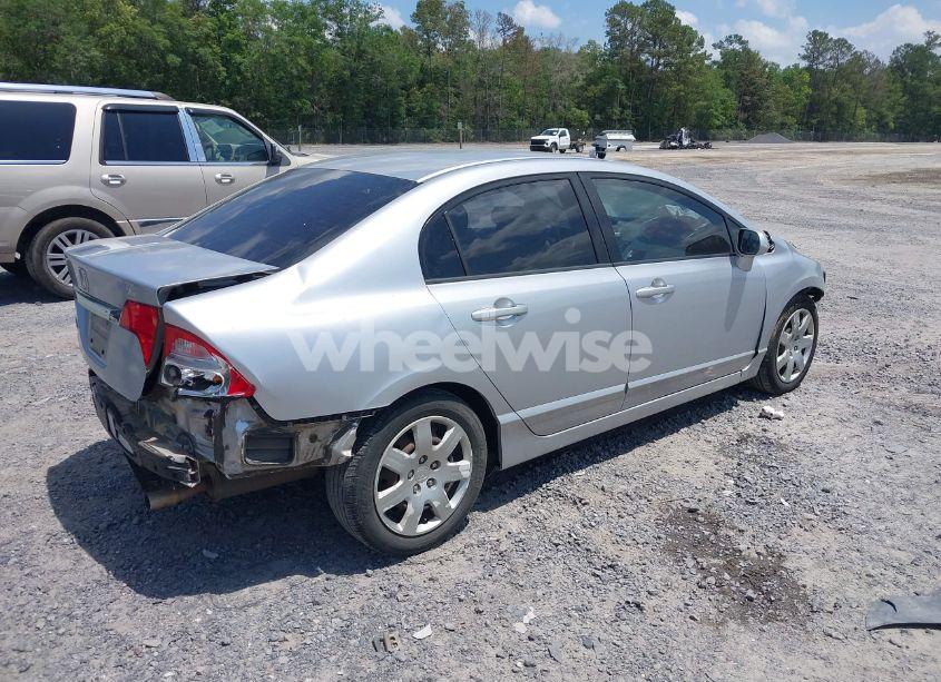 Photo 4 of 2011 Honda Civic LX (VIN 2HGFA1F52BH513329)