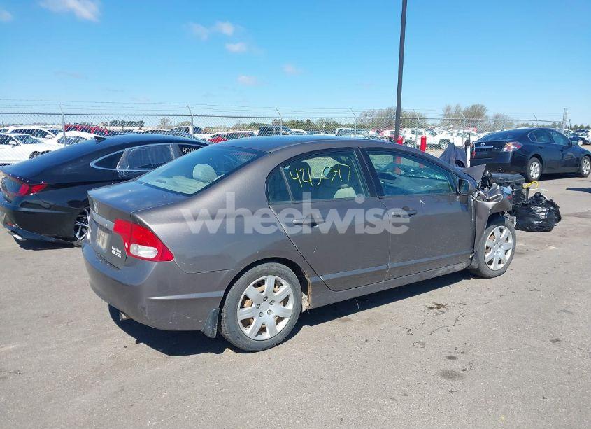 Photo 4 of 2011 Honda Civic LX (VIN 2HGFA1F52BH523214)
