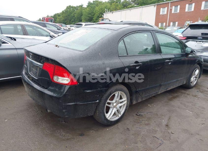 Photo 4 of 2011 Honda Civic LX (VIN 2HGFA1F53BH308540)