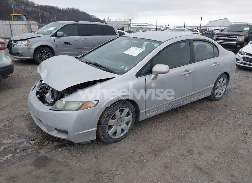 Photo 2 of 2011 Honda Civic LX (VIN 2HGFA1F54BH506463)