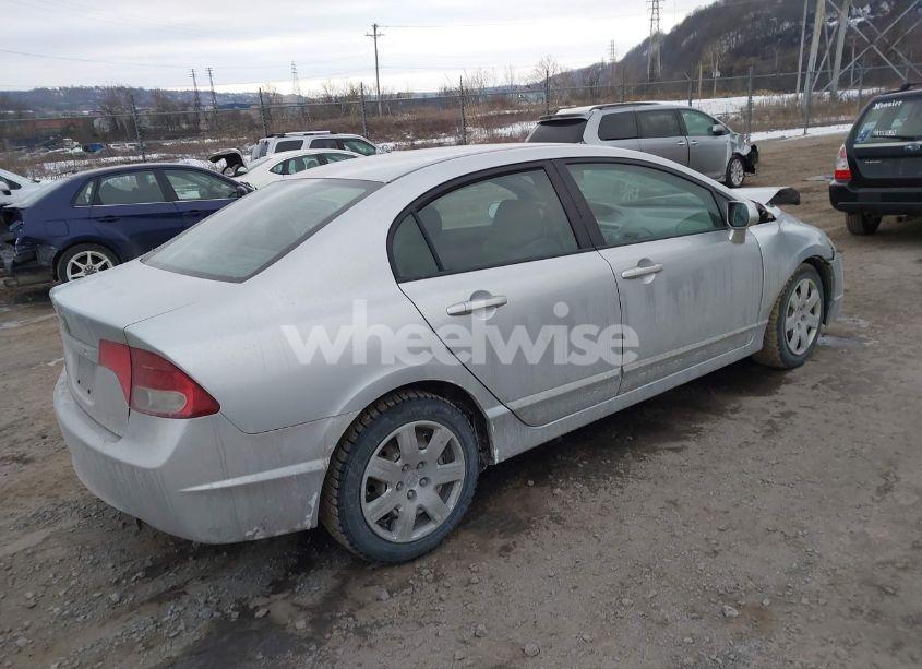 Photo 4 of 2011 Honda Civic LX (VIN 2HGFA1F54BH506463)