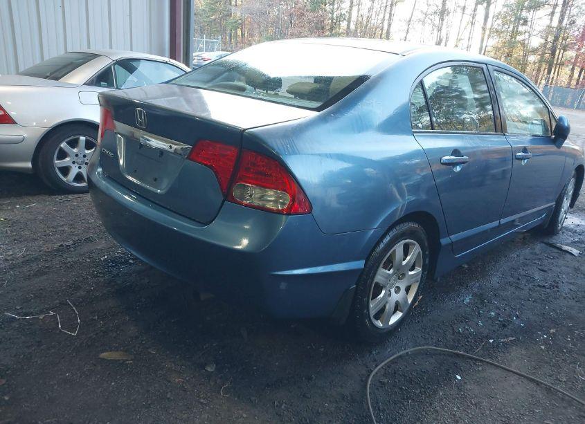 Photo 4 of 2011 Honda Civic LX (VIN 2HGFA1F54BH516295)