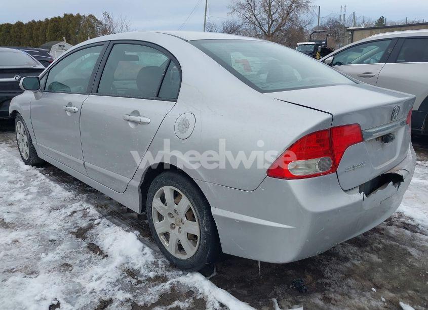 Photo 3 of 2011 Honda Civic LX (VIN 2HGFA1F54BH520203)