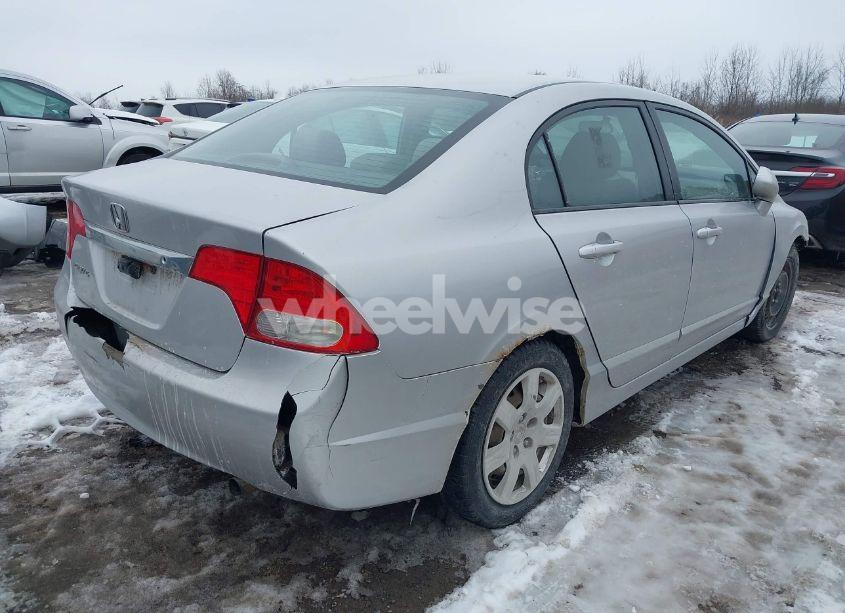 Photo 4 of 2011 Honda Civic LX (VIN 2HGFA1F54BH520203)