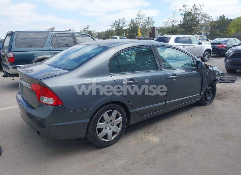 Photo 4 of 2011 Honda Civic LX (VIN 2HGFA1F55BH301606)