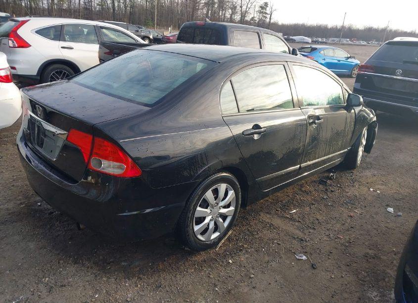 Photo 4 of 2011 Honda Civic LX (VIN 2HGFA1F55BH303601)